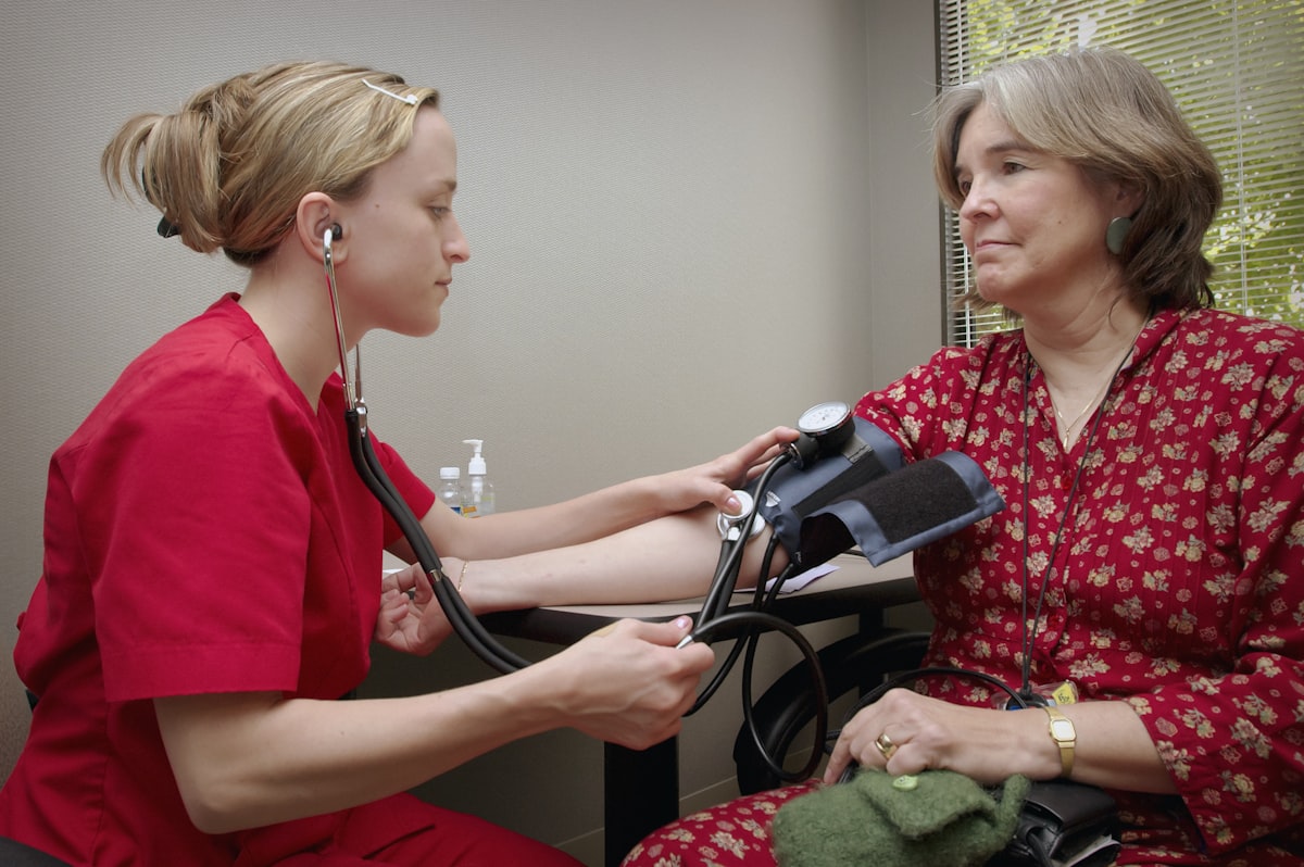 Healthcare professional consulting with patient